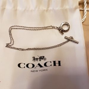 Silver coach bracelet